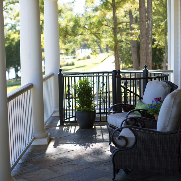 Front porch overlooking a sidewalk