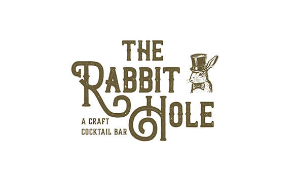 The Rabbit Hole - A Craft Cocktail Bar logo